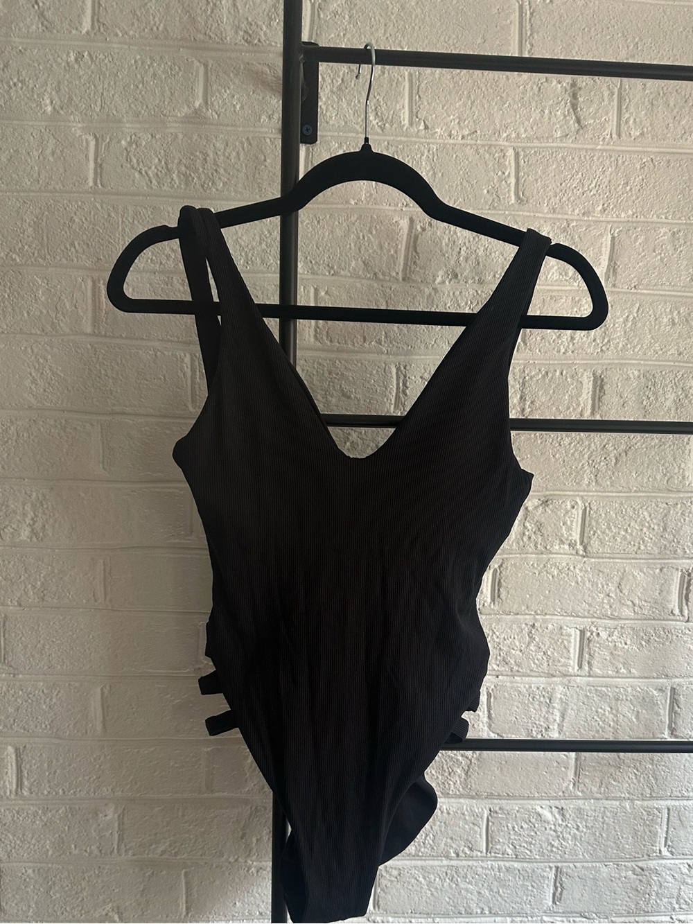 BECCA Black Ribbed One-Piece Swimsuit with Cut Outs